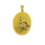 Victorian unmarked gold locket by Harry Emanuel, relief decorated with a bird in a nest with pearl