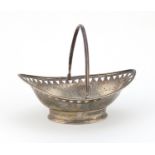 Georgian silver basket with swing handle, engraved with swags and pierced rim, indistinct makers