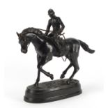Patinated bronze model of a jockey on horseback, 31cm high :For Further Condition Reports Please