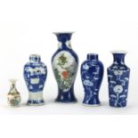 Five Chinese porcelain vases including two hand painted with prunus flowers and one hand painted