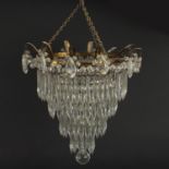 Circular brass five tier chandelier with cut glass drops, 50cm high x 30cm in diameter :For