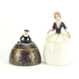 Two Carlton Ware crinoline lady design pot and covers, the largest 20cm high :For Further