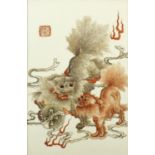 Chinese porcelain panel housed in hardwood frame, finely hand painted with two Shishi with a ball,