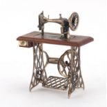 Novelty miniature silver model of a sewing machine, impressed marks 925, 9.5cm high :For Further