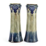 Pair of Art Nouveau Royal Doulton vases, decorated in low relief with stylised flowers, impressed