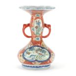 Japanese Arita porcelain vase with twin handles, hand painted with birds and flowers, six figure