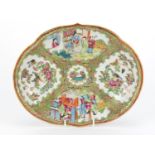 Chinese Canton dish finely hand painted in the famille rose palette with figures, birds, insects and