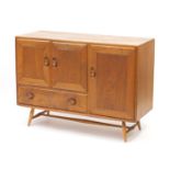 Ercol Windsor light elm sideboard fitted with three cupboard doors and a drawer, 82cm H x 115cm W