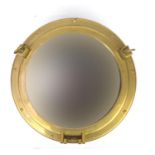 Brass ships porthole design mirror, 47cm in diameter :For Further Condition Reports Please Visit Our