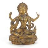 Chino-Tibetan gilt bronze jewelled figure of Buddha, set with coral and turquoise, 19.5cm high :