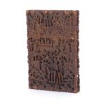 Chinese Canton sandalwood card case profusely carved with figures amongst pagodas crossing