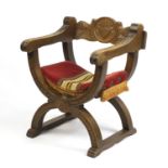 Carved fruitwood X framed chair, 75cm high :For Further Condition Reports Please Visit Our