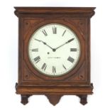 Railway interest oak cased American wall clock by Seth Thomas, the painted dial with Roman numerals,
