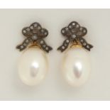 Pair of cultured pearl and diamond bow design earrings, 2.5cm in length, 7.2g :For Further Condition