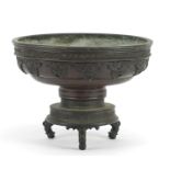 Chinese bronze bowl on tripod stand, 12.5cm high x 16.5cm in diameter :For Further Condition Reports