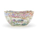 Chinese porcelain bowl, hand painted in the famille rose palette with dragons amongst clouds and