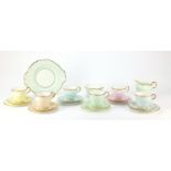 Paragon Harlequin six place tea service with milk jug and sugar bowl, the largest 25cm in length :
