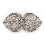 Victorian silver two piece nurses buckle pierced with putti and maidens, indistinct makers mark,