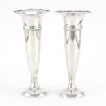 Pair of silver candlesticks of tapering form by William Devenport, Birmingham 1926, 15.5cm high,