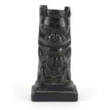 Haida argillite carving of a totem pole, 20.5cm high :For Further Condition Reports Please Visit Our