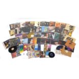 Vinyl LP's and singles including The Beatles Abbey Road with misaligned Apple sleeve, Prince and The