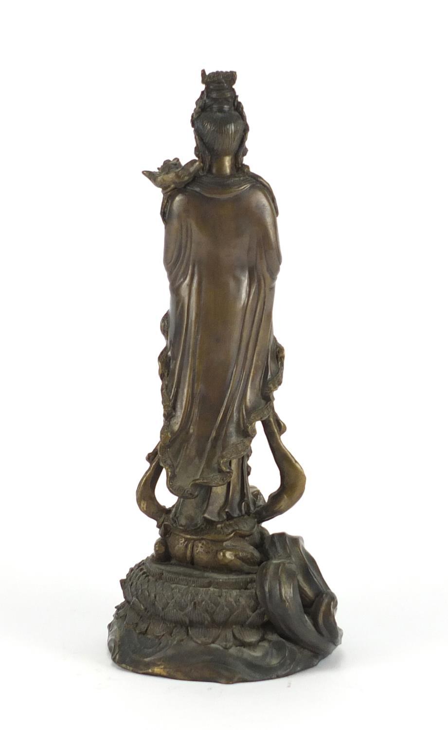 Chinese bronze figure of Guanyin standing on a toad and lotus leaf, 33cm high :For Further Condition - Image 5 of 6