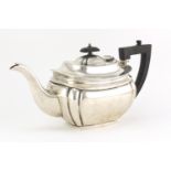 Silver teapot with ebonised handle and knop by Viners Ltd, Sheffield 1936, 30.5cm in length, 765.