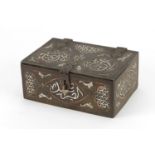 Islamic Cairo Ware casket with copper and silver inlay, decorated with calligraphy, 5cm H x 11.5cm W