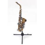 French saxophone by Dolnet with case, serial number 47523, 66cm in length :For Further Condition