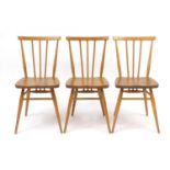 Set of three Ercol Windsor light elm stick back chairs, model 391, each 78cm high :For Further