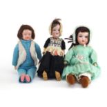 Three bisque headed dolls comprising Armand Marseille, Simon & Halbig and Chester, the largest