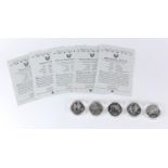 Five sporting United States of America silver dollars with certificates including World Cup and