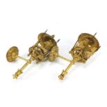 Pair of classical gilt brass wall lights, with pineapple finials and reeded columns, each 44cm