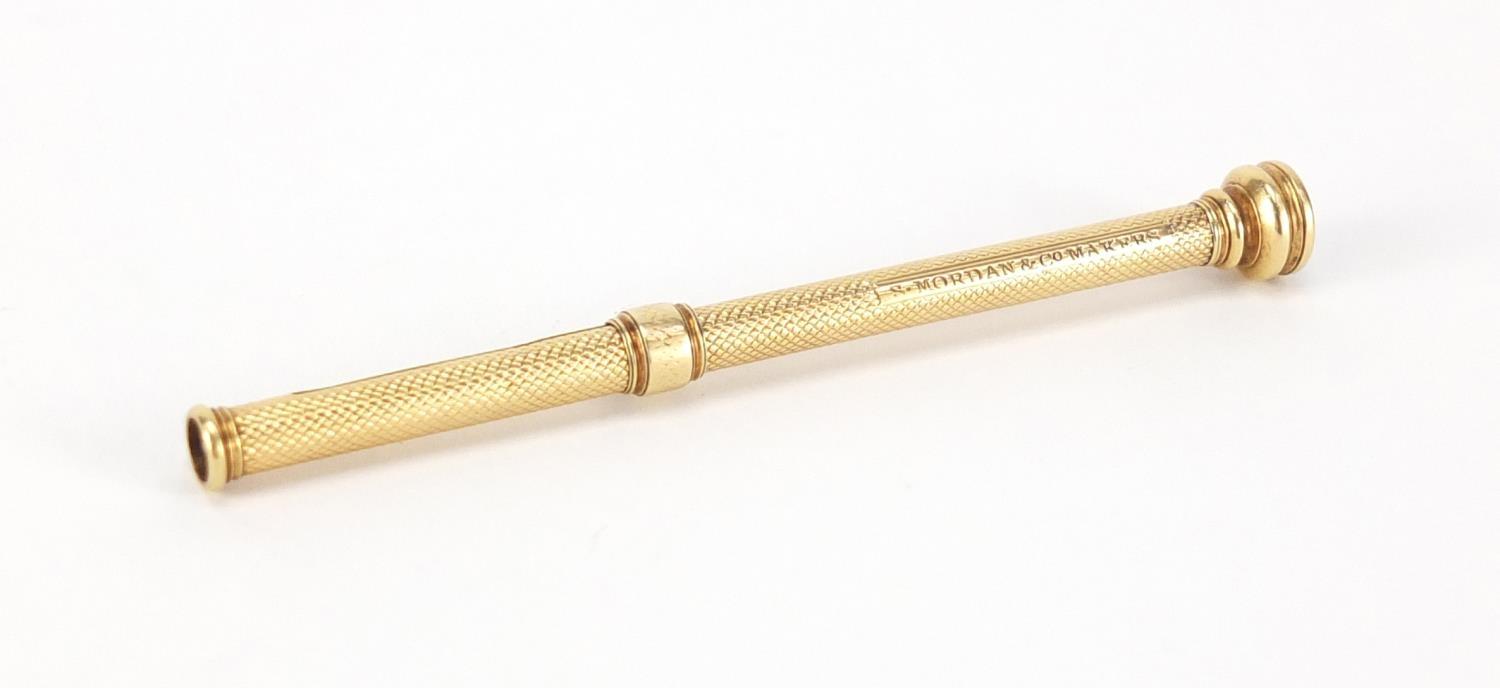 S Mordan & Co unmarked gold propelling pencil with amethyst top, 8.5cm in length, 8.8g :For