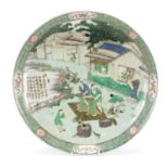 Chinese porcelain charger hand painted in the famille verte palette with workers and calligraphy,