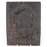 19th century Tibetan bronzed copper plaque, embossed with mythical figures and animals, 20cm x