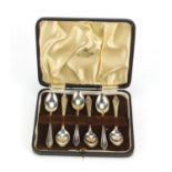 Set of six silver teaspoons housed in a fitted leather box, E J E Sheffield 1945, 11cm in length,