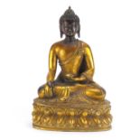 Chino-Tibetan gilt bronze figure of Buddha seated in the lotus position, 33cm high :For Further
