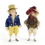Pair of early 19th century bisque dolls house dolls with jointed limbs, probably French, each 15.5cm