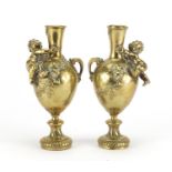 Auguste Moreau, pair of 19th century bronze vases, each modelled with a cherub and cast in relief