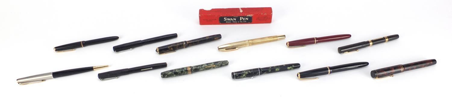 Fountain pens and Parker 61 dip pen including a Waterman's with 9ct gold bands, Swan self filler,