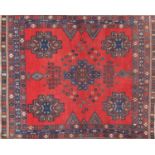 Blue and red ground rug with all over geometric design, 160cm x 133cm :For Further Condition Reports