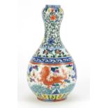 Chinese porcelain Doucai garlic neck vase, hand painted with dragons chasing the flaming pearl