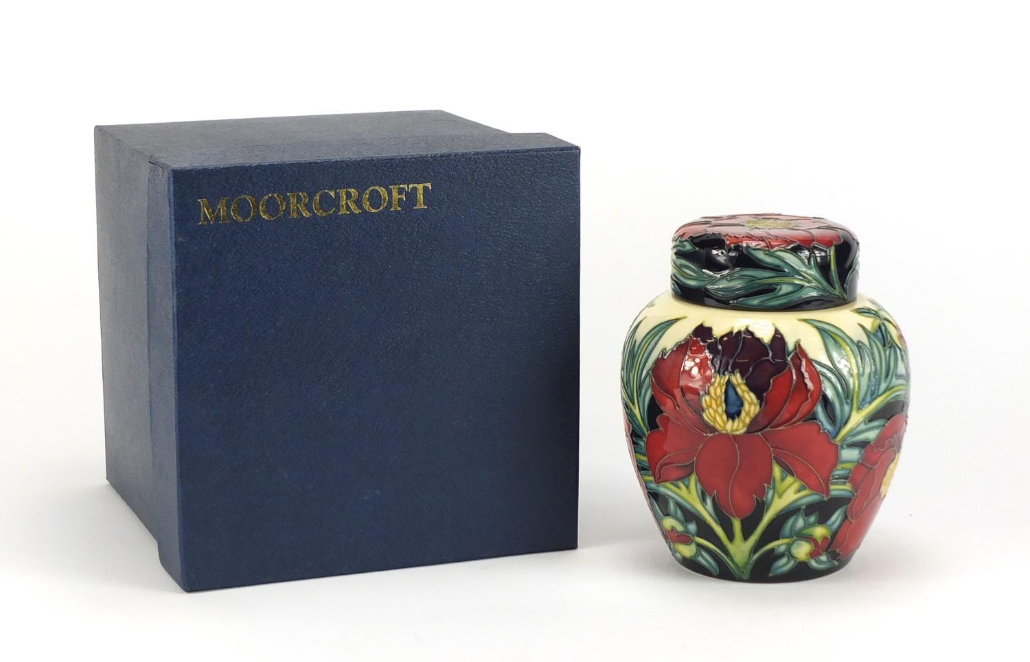 Moorcroft pottery ginger jar and cover with box, hand painted with stylised flowers, dated 2004,