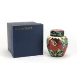 Moorcroft pottery ginger jar and cover with box, hand painted with stylised flowers, dated 2004,