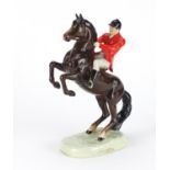 Beswick huntsman on a rearing horse, number 868, 24cm high :For Further Condition Reports Please
