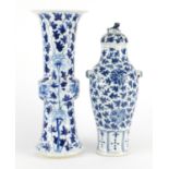 Two Chinese blue and white porcelain vases comprising a Gu vase hand painted with dragons and a