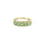 9ct gold emerald half eternity ring, size K, 2.0g :For Further Condition Reports Please Visit Our