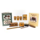 Woodenware and reference books including Mauchline Ware pin cushion, Tunbridge Ware letter opener