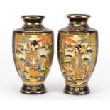 Pair of Japanese Satsuma pottery vases, each hand painted with panels of figures and flowers onto